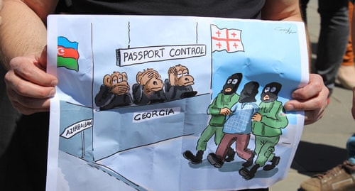 Плакат участника акции в поддержку Афгана Мухтарлы. Фото Инны Кукуджановой для «Кавказского узла»