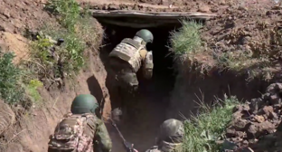 Российские бойцы. Стоп-кадр видео Минобороны России от 21.06.25, https://t.me/mod_russia/53966