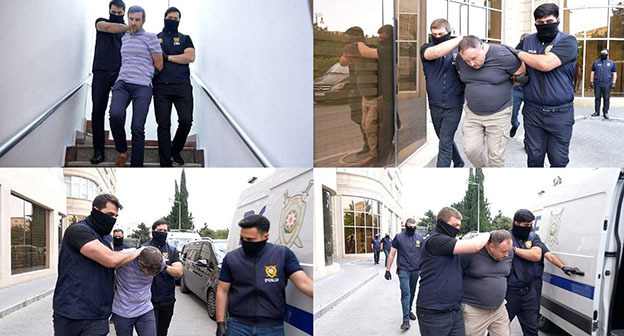 Силовики выводят задержанных в офисе "Sputnik Азербайджан". Фото: https://minval.az/news/124473135