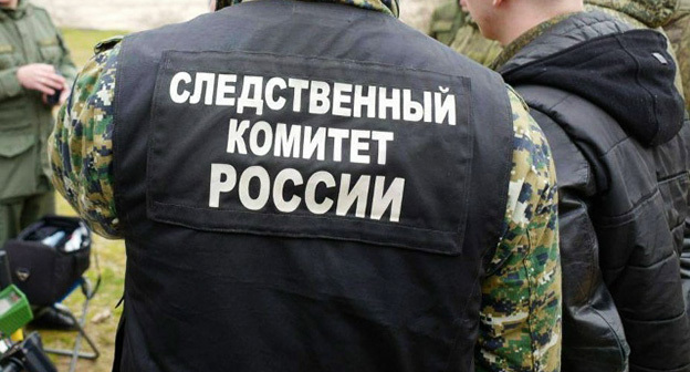 Сотрудник следственного комитета. Фото: https://vk.ru/kuban.sledcom